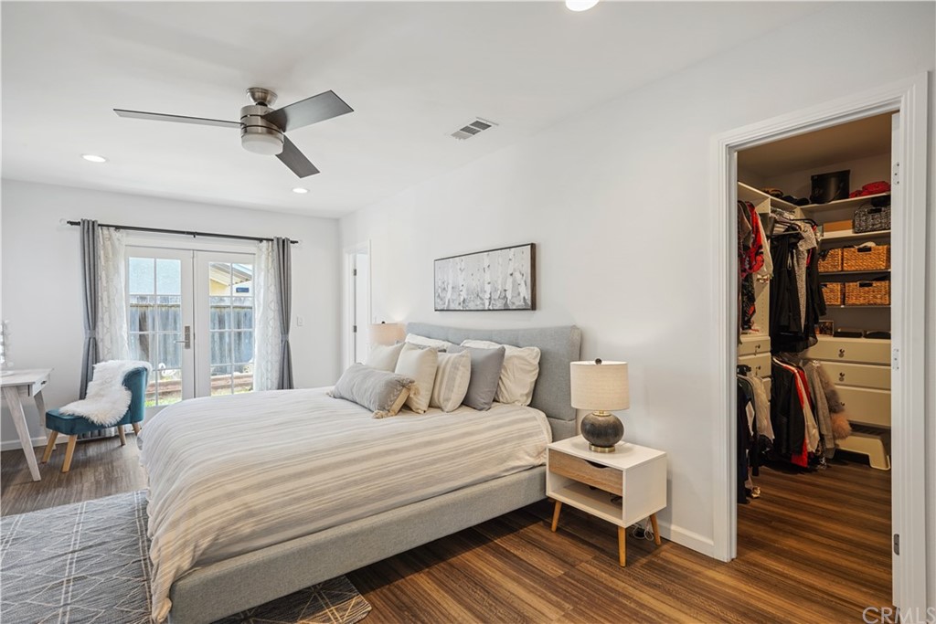 14709 Bodger Avenue Hawthorne, CA 90250 - Photo 8 of 24 a bedroom with a bed and wooden floor