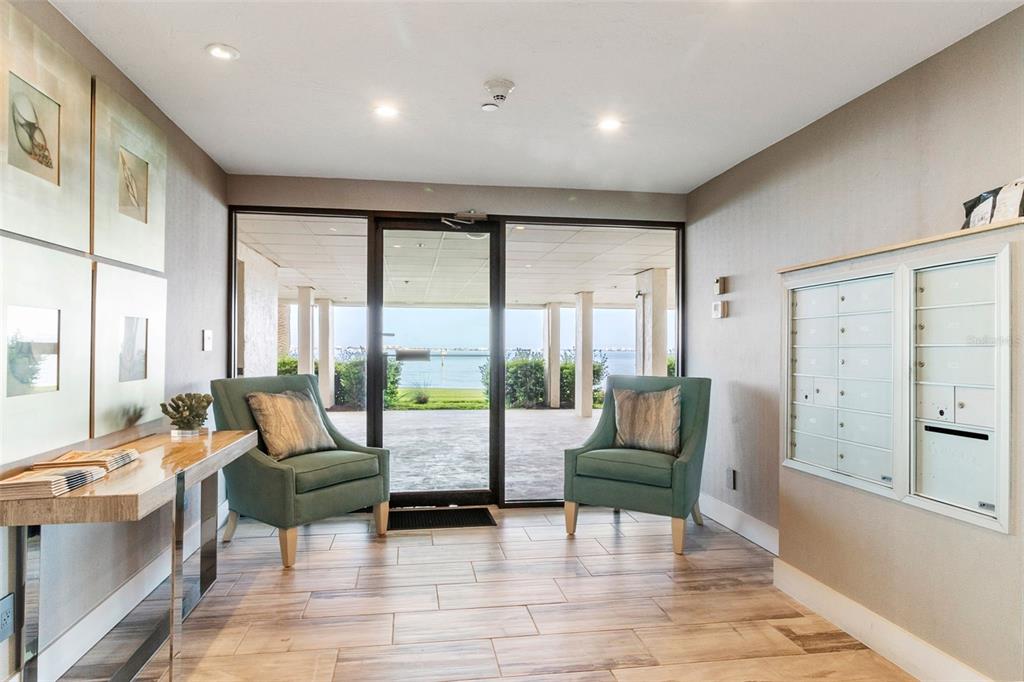 101 Sunset Drive, Unit PH3 Sarasota, FL 34236 - Photo 37 of 47 a living room with furniture and a large window