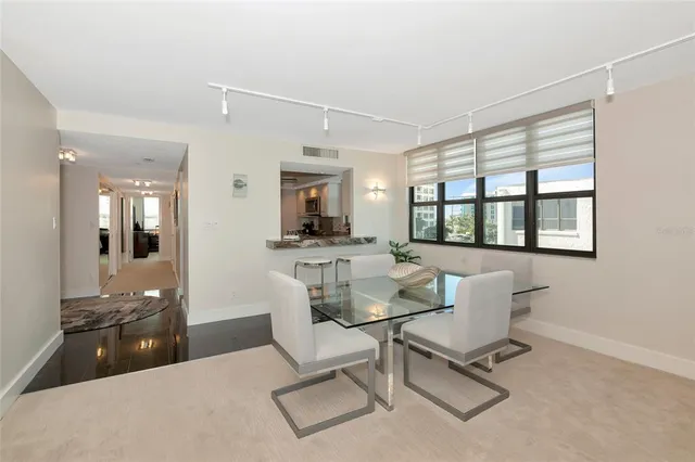 a view of a dining room with furniture