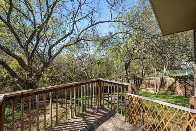 a view of a wooden roof deck