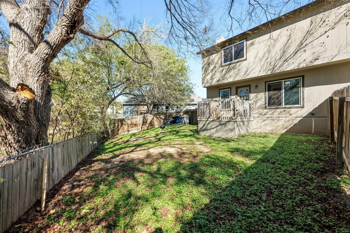 6101 Asa Drive, Unit A Austin, TX 78744 - Photo 19 of 20 a view of a house with backyard and sitting area