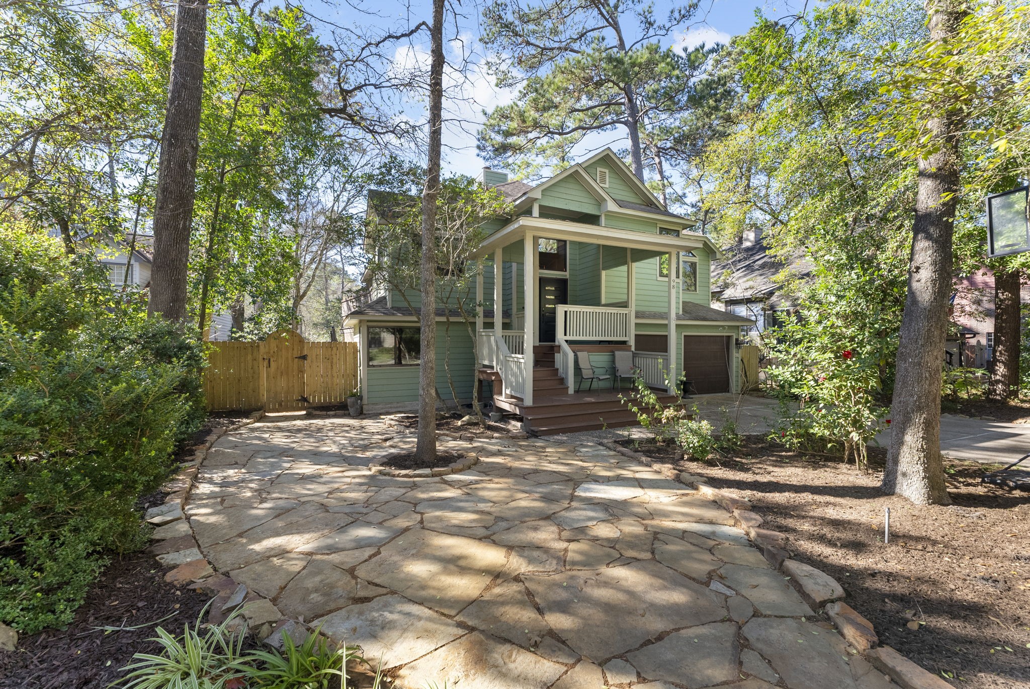 Welcome to this Craftsman style home in the heart of The Woodlands.