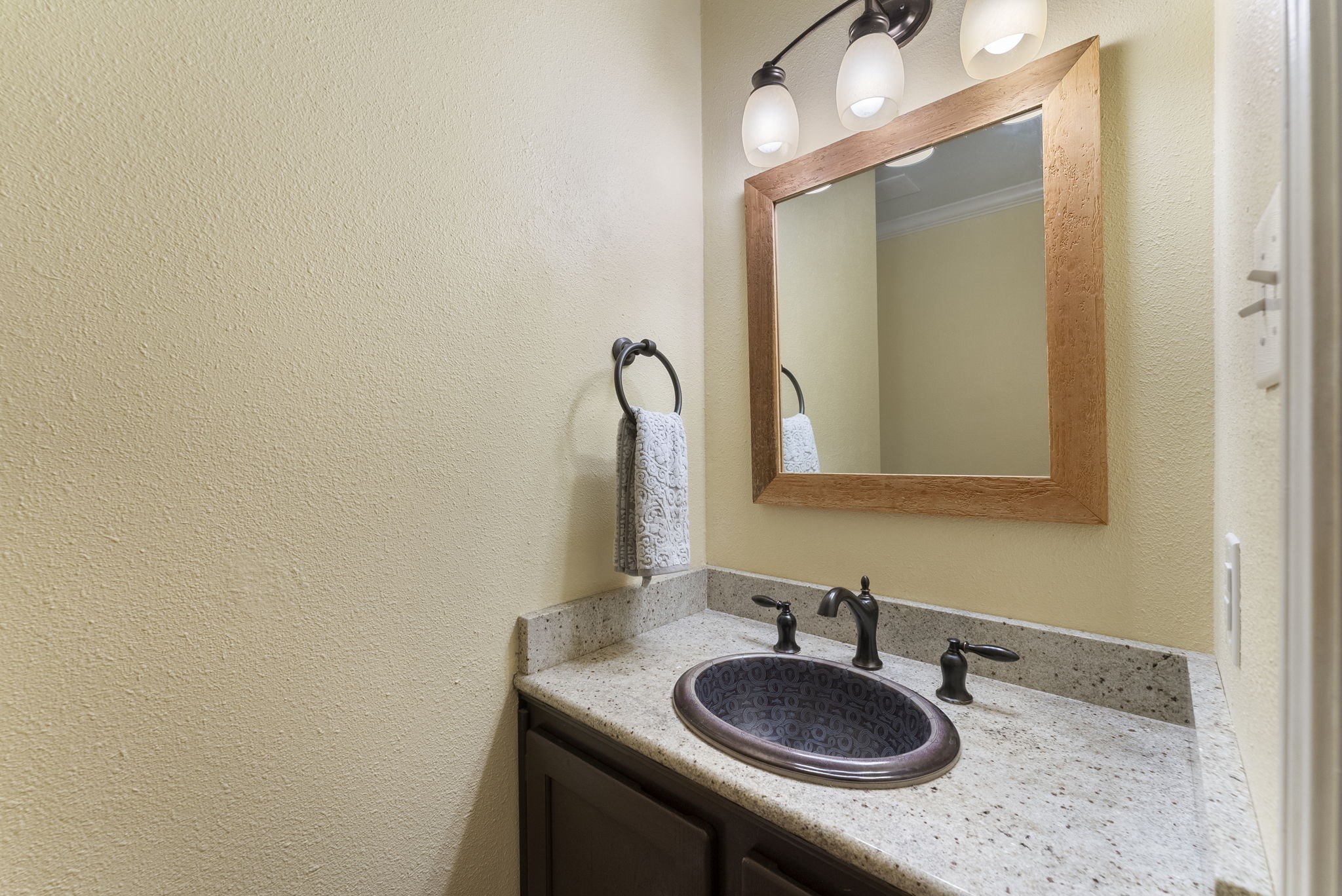 98 South Wilde Yaupon Court Spring, TX 77381 - Photo 16 of 49 For added convenience, there is a powder room on the second level.