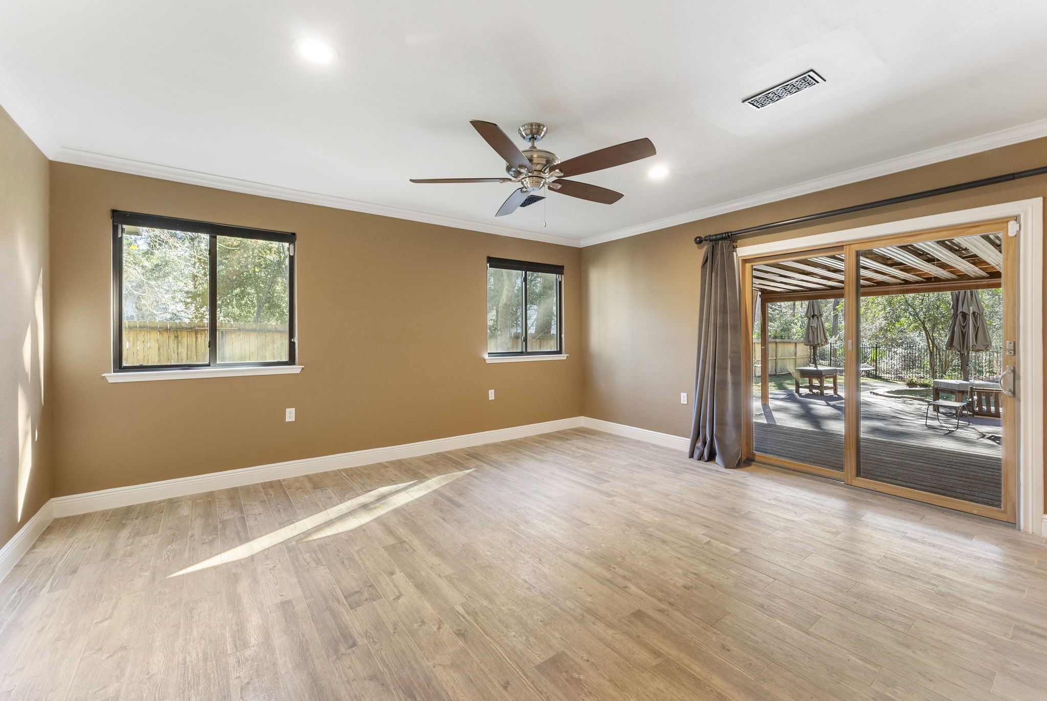 98 South Wilde Yaupon Court Spring, TX 77381 - Photo 19 of 49 Enjoy the game room’s direct access to a private, covered deck overlooking the inviting backyard pool.