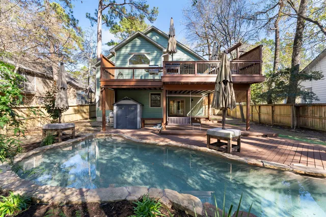 a view of swimming pool with a patio
