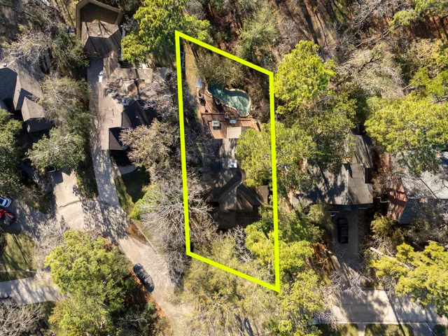 a view of pool with wooden deck