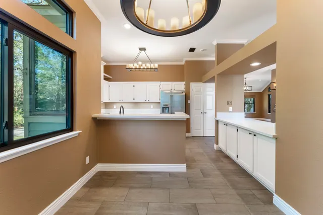 an empty room with a large window