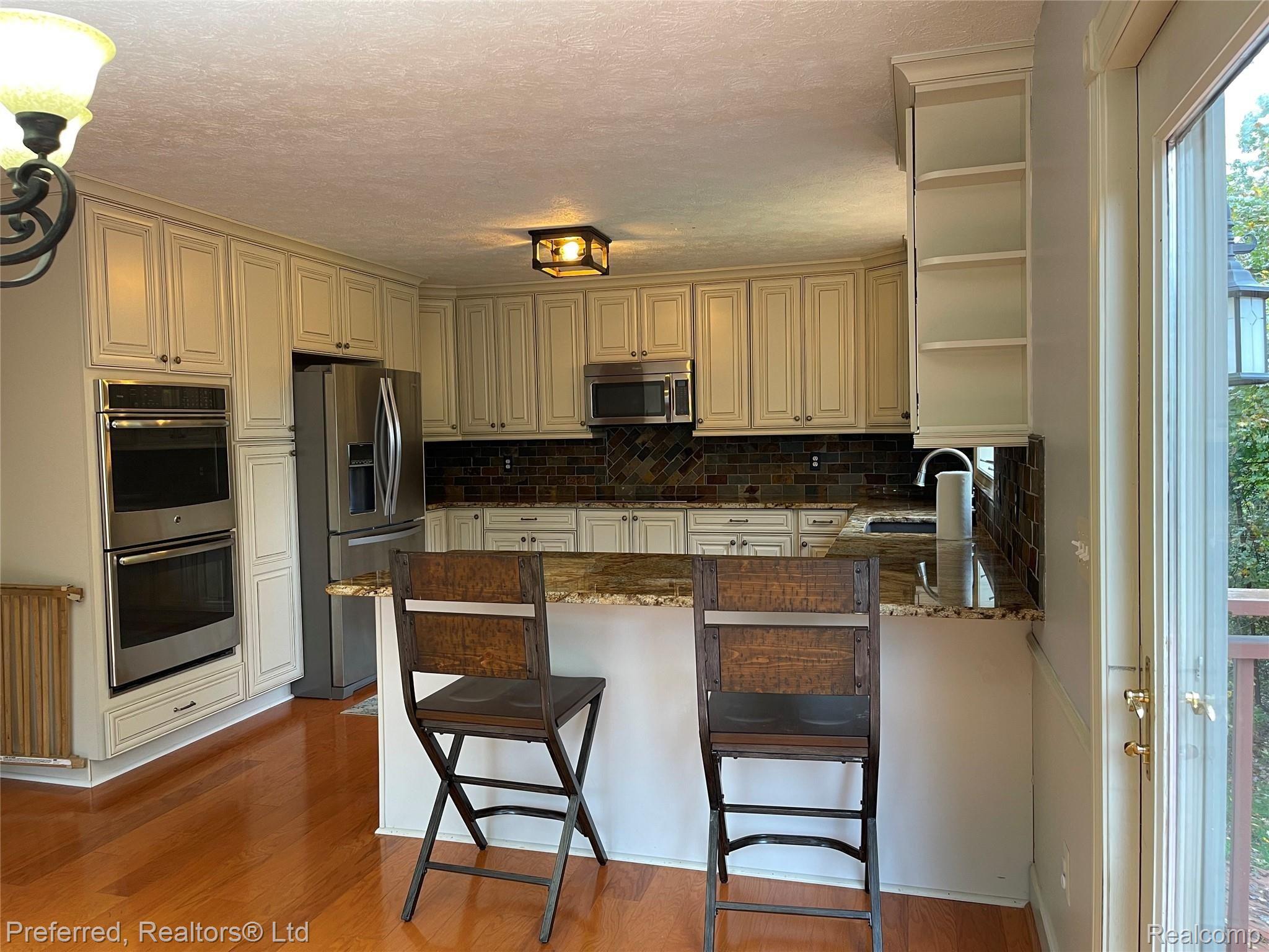 1974 Sexton Road Howell, MI 48843 - Photo 10 of 49 Breakfast Bar top seating
