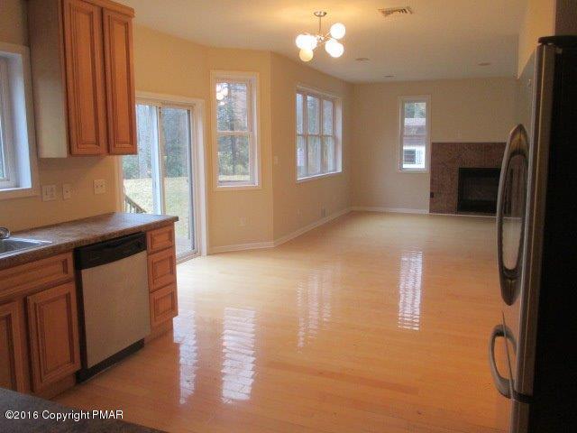 5113 Goose Pond Road Tobyhanna, PA 18466 - Photo 6 of 17 KITCHEN FAMILY ROOM
