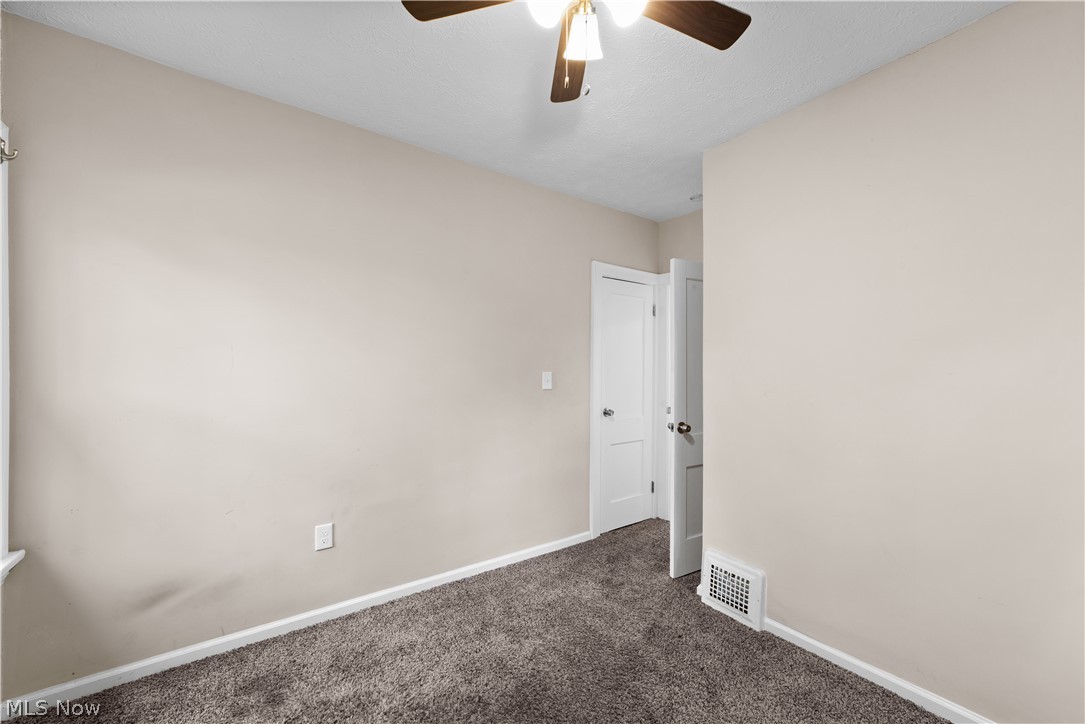 1062 Yellowstone Road Cleveland Heights, OH 44121 - Photo 14 of 29 Carpeted spare room featuring ceiling fan