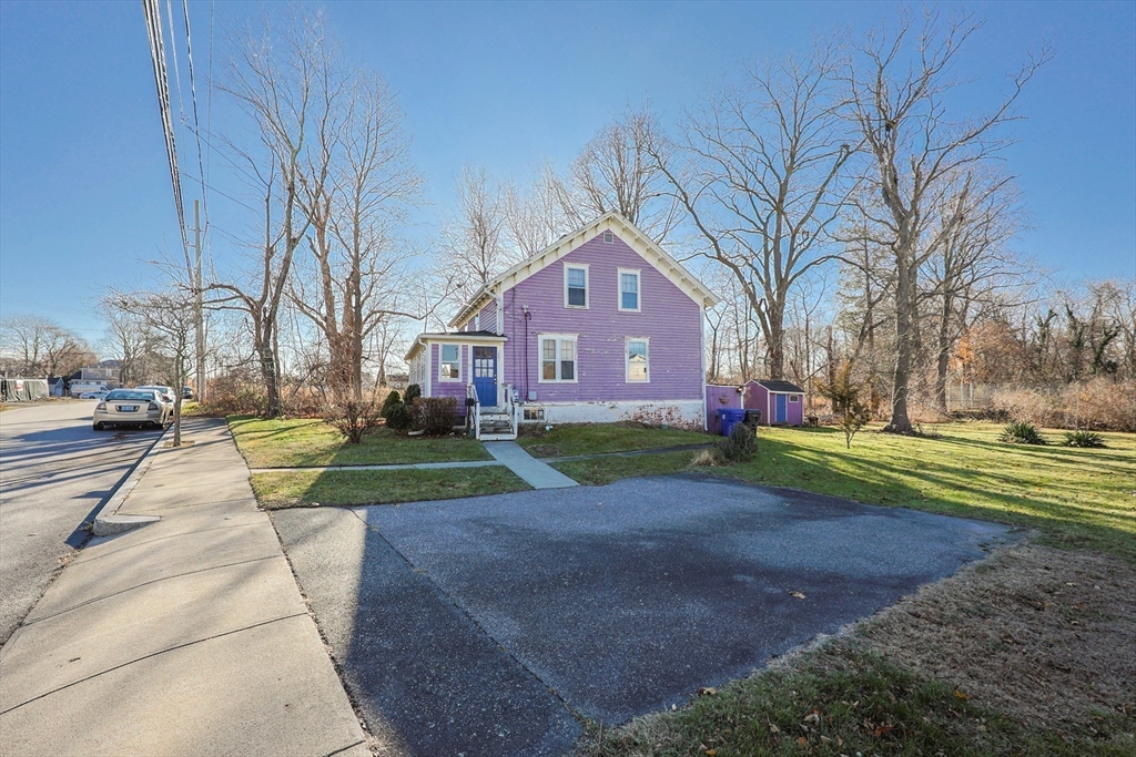 69 Cutler Street Warren, RI 02885 - Photo 4 of 13 a view of house with a street