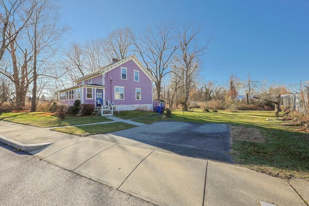 69 Cutler Street Warren, RI 02885 - Photo 5 of 13 a view of yard with swimming pool and green space
