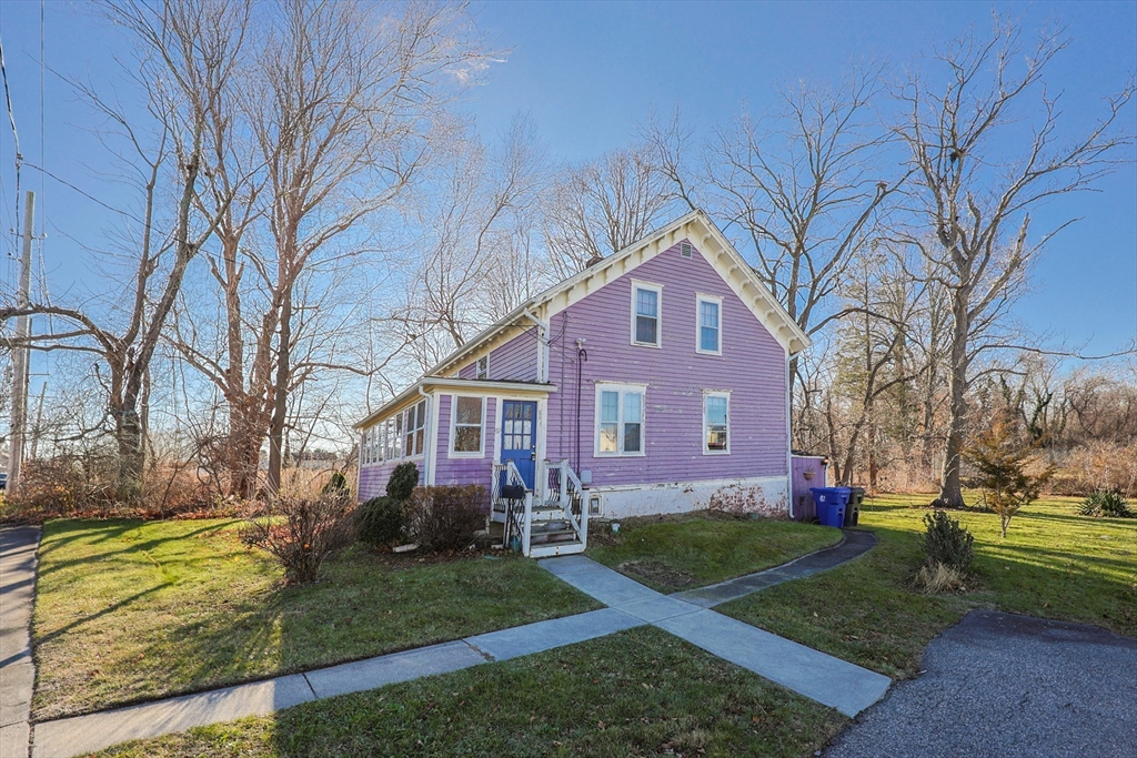 69 Cutler Street Warren, RI 02885 - Photo 6 of 13 a view of house with a yard