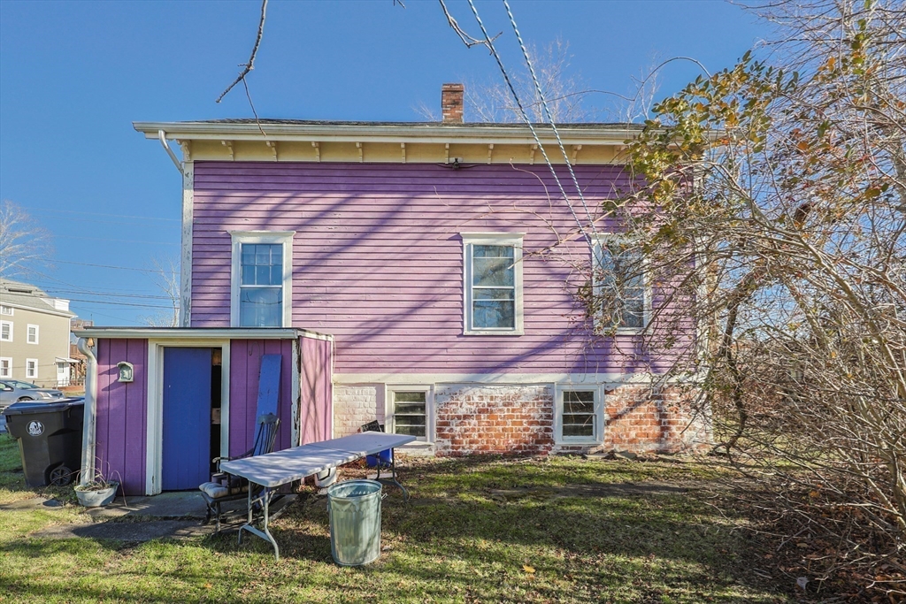 69 Cutler Street Warren, RI 02885 - Photo 7 of 13 a view of a house with a yard