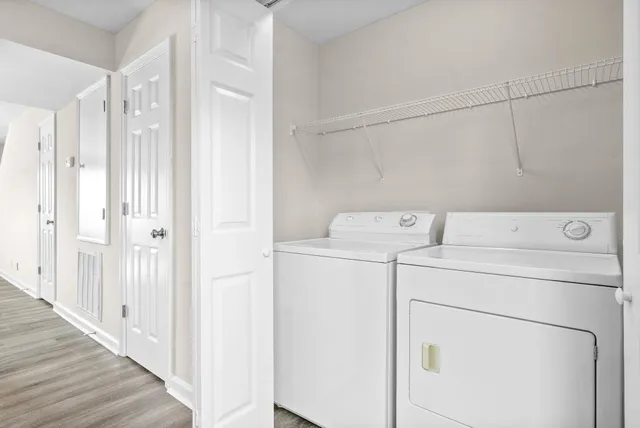 a utility room with dryer and washer