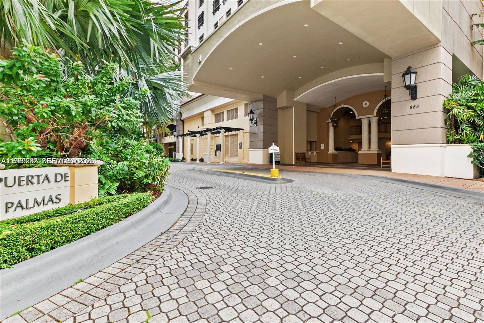 888 Douglas Road, Unit 1002 Coral Gables, FL 33134 - Photo 1 of 34 a view of a garden