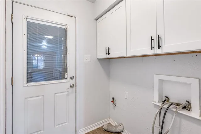 a view of a livingroom with a dinning table and chair