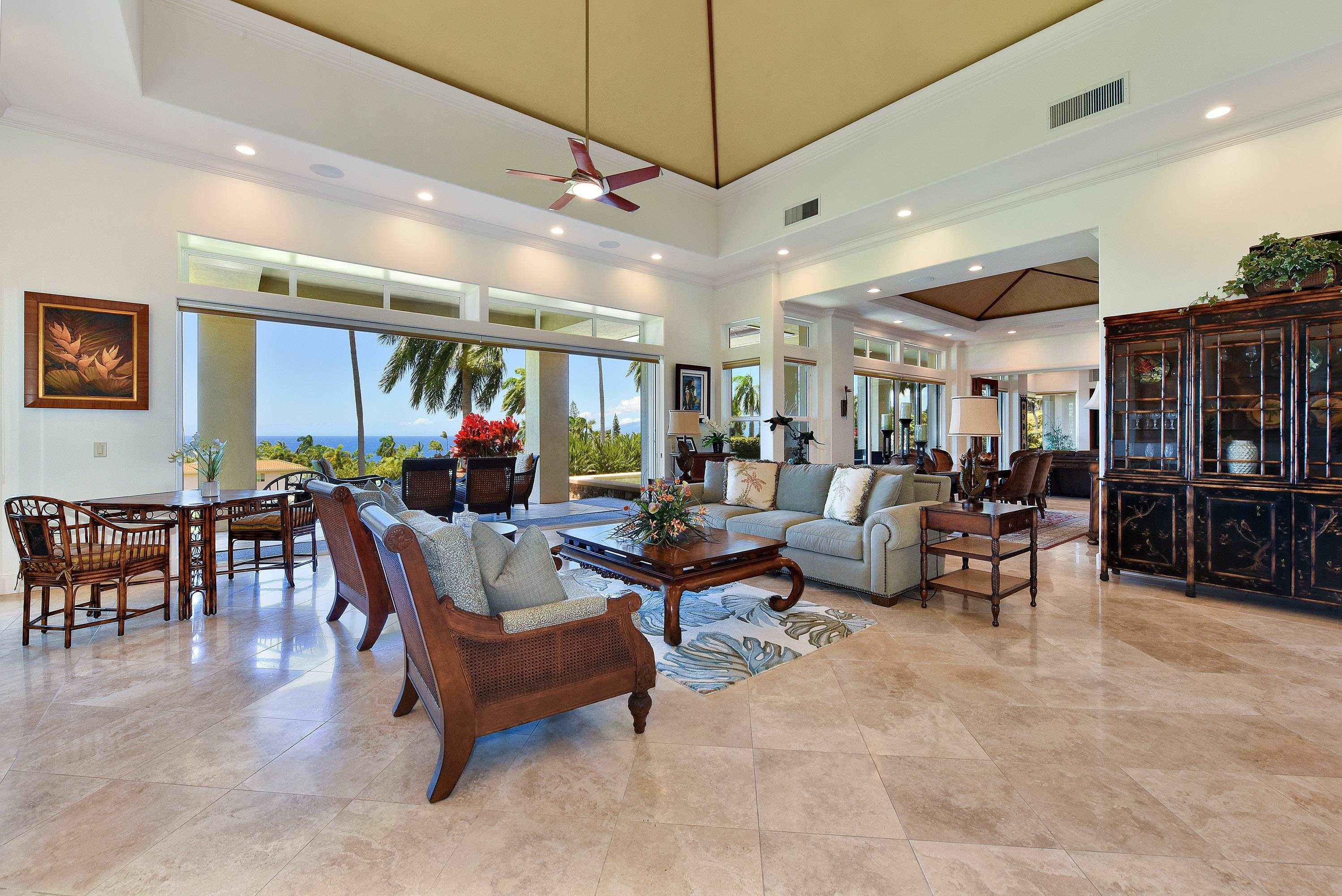 175 Ulukoa Place Lahaina, HI 96761 - Photo 11 of 50 a living room with furniture and a large window