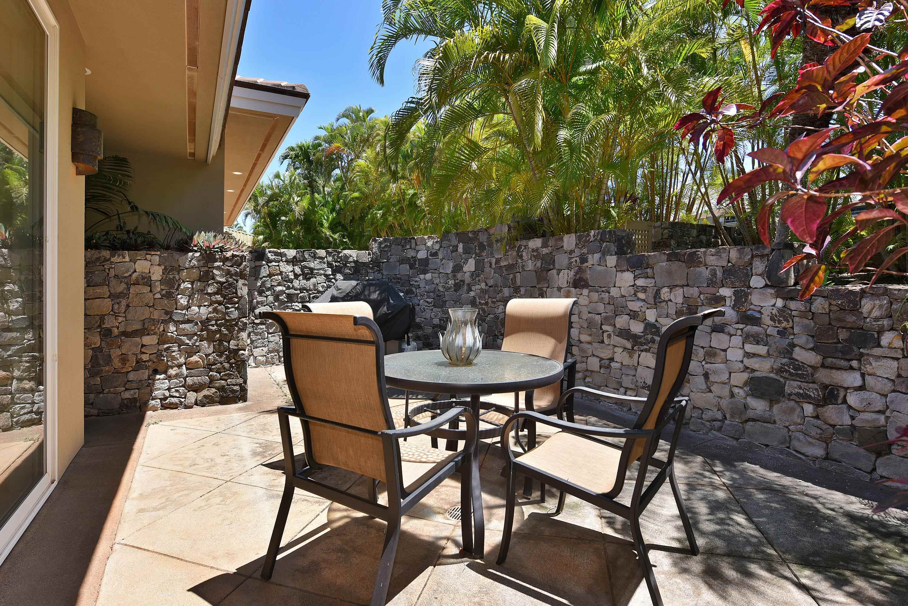 175 Ulukoa Place Lahaina, HI 96761 - Photo 22 of 50 a view of a chairs and table in patio