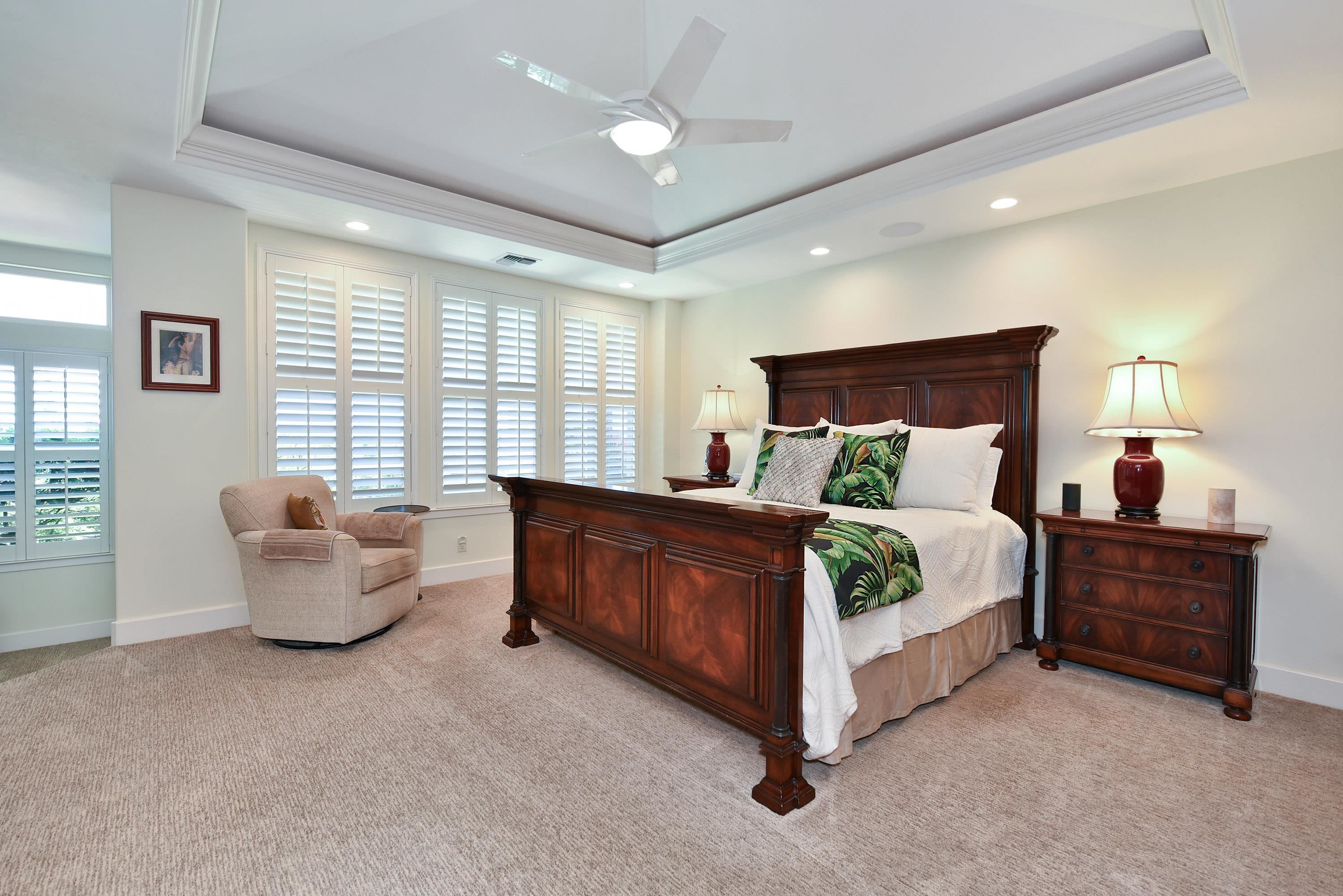 175 Ulukoa Place Lahaina, HI 96761 - Photo 25 of 50 a bed room with a bed and a couch