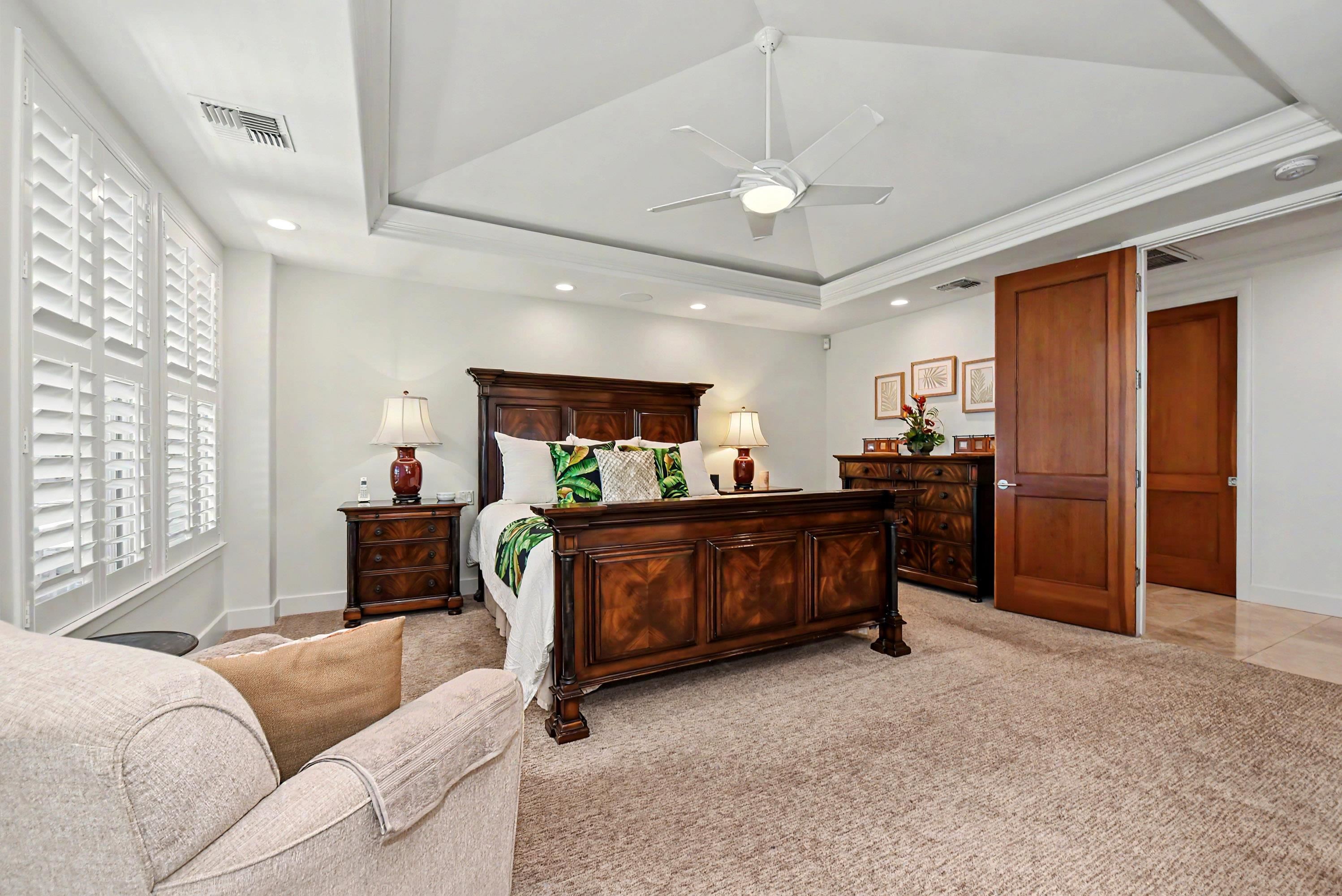 175 Ulukoa Place Lahaina, HI 96761 - Photo 26 of 50 a living room with furniture and a flat screen tv