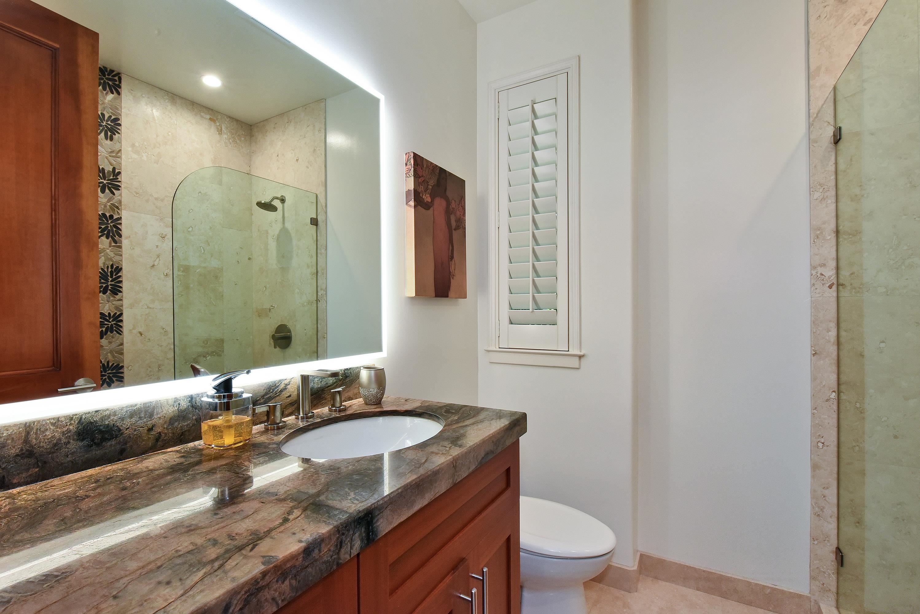 175 Ulukoa Place Lahaina, HI 96761 - Photo 36 of 50 a bathroom with a granite countertop sink toilet and shower