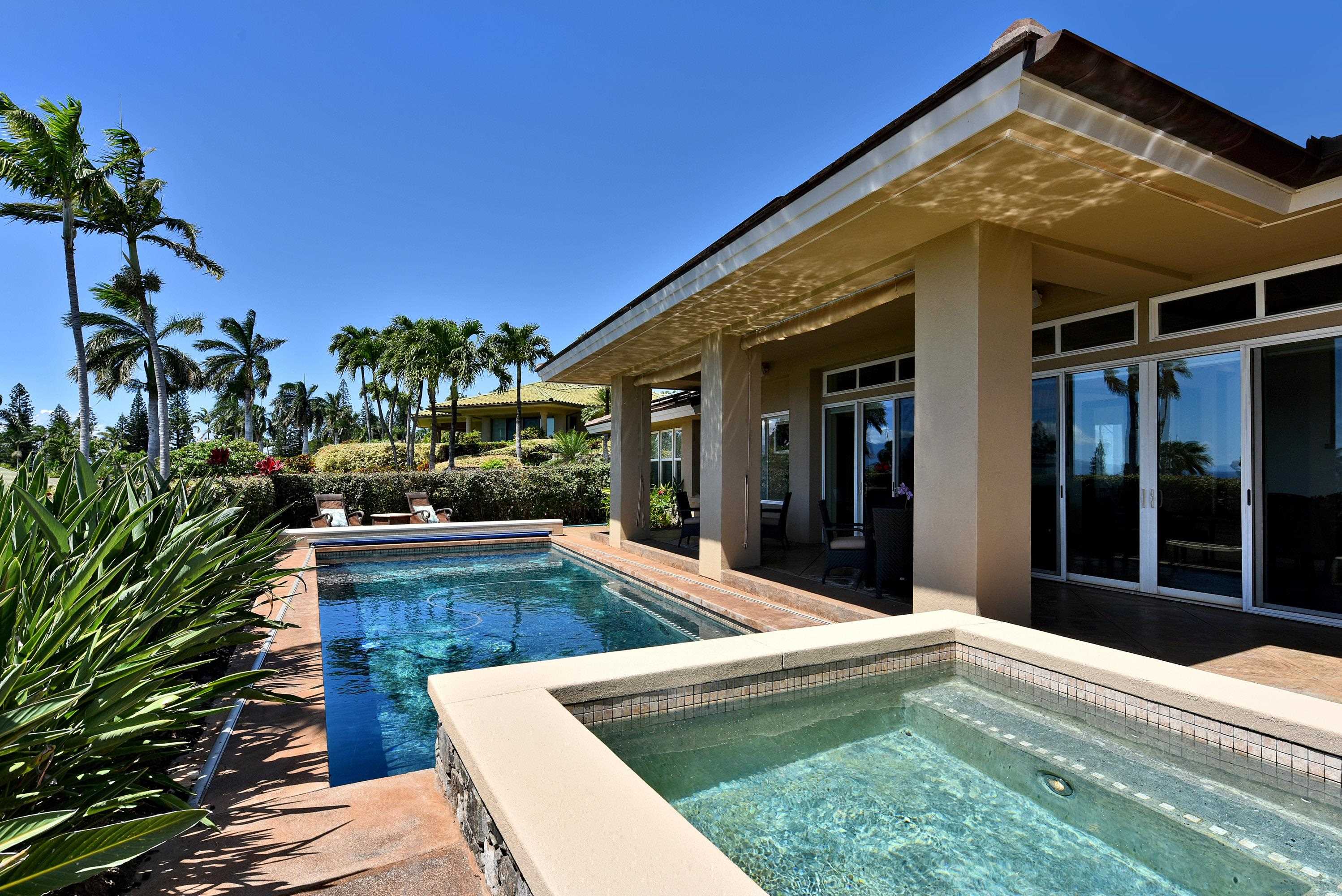 175 Ulukoa Place Lahaina, HI 96761 - Photo 41 of 50 a view of a house with a swimming pool and sitting area