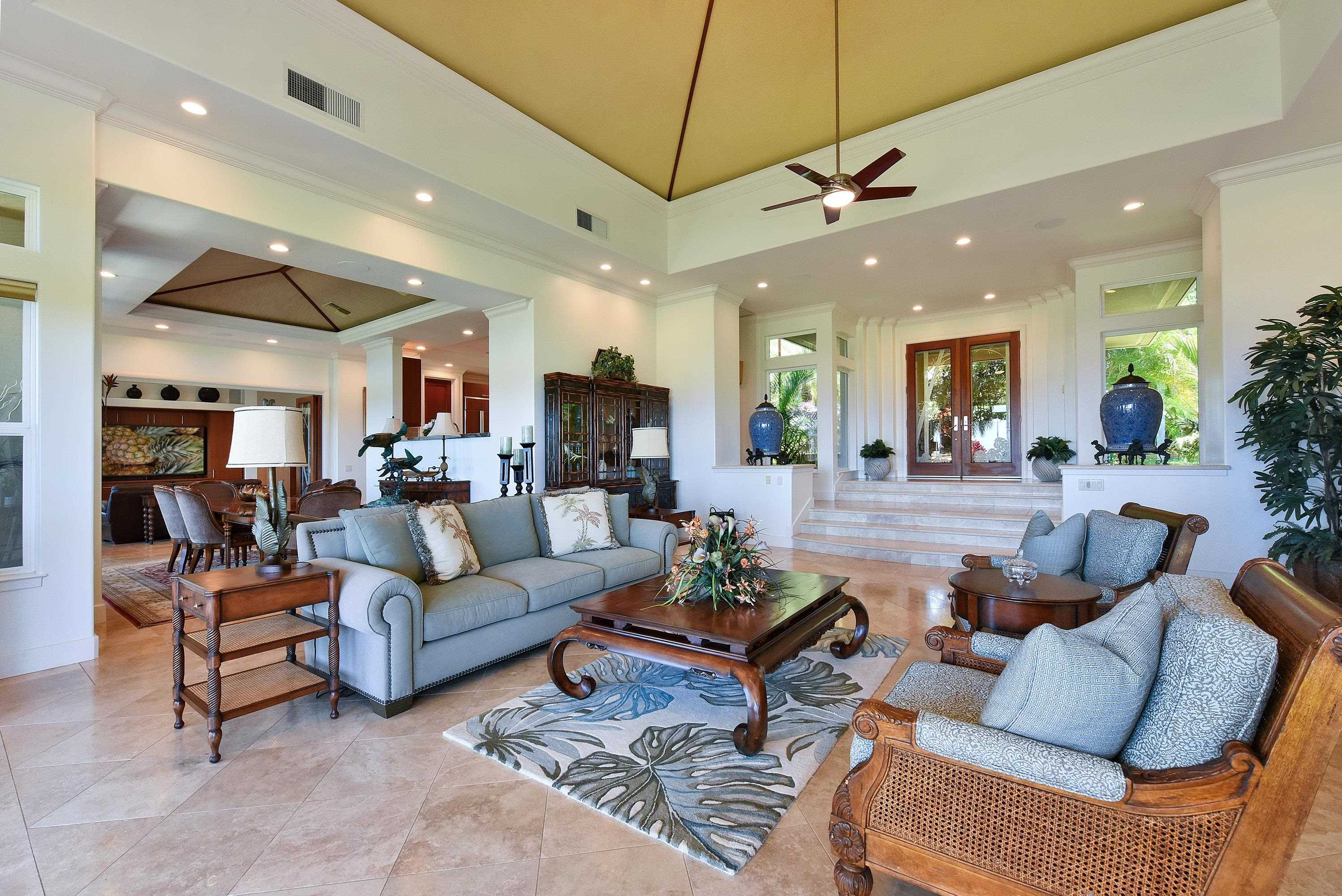 175 Ulukoa Place Lahaina, HI 96761 - Photo 9 of 50 a living room with furniture kitchen view and a chandelier