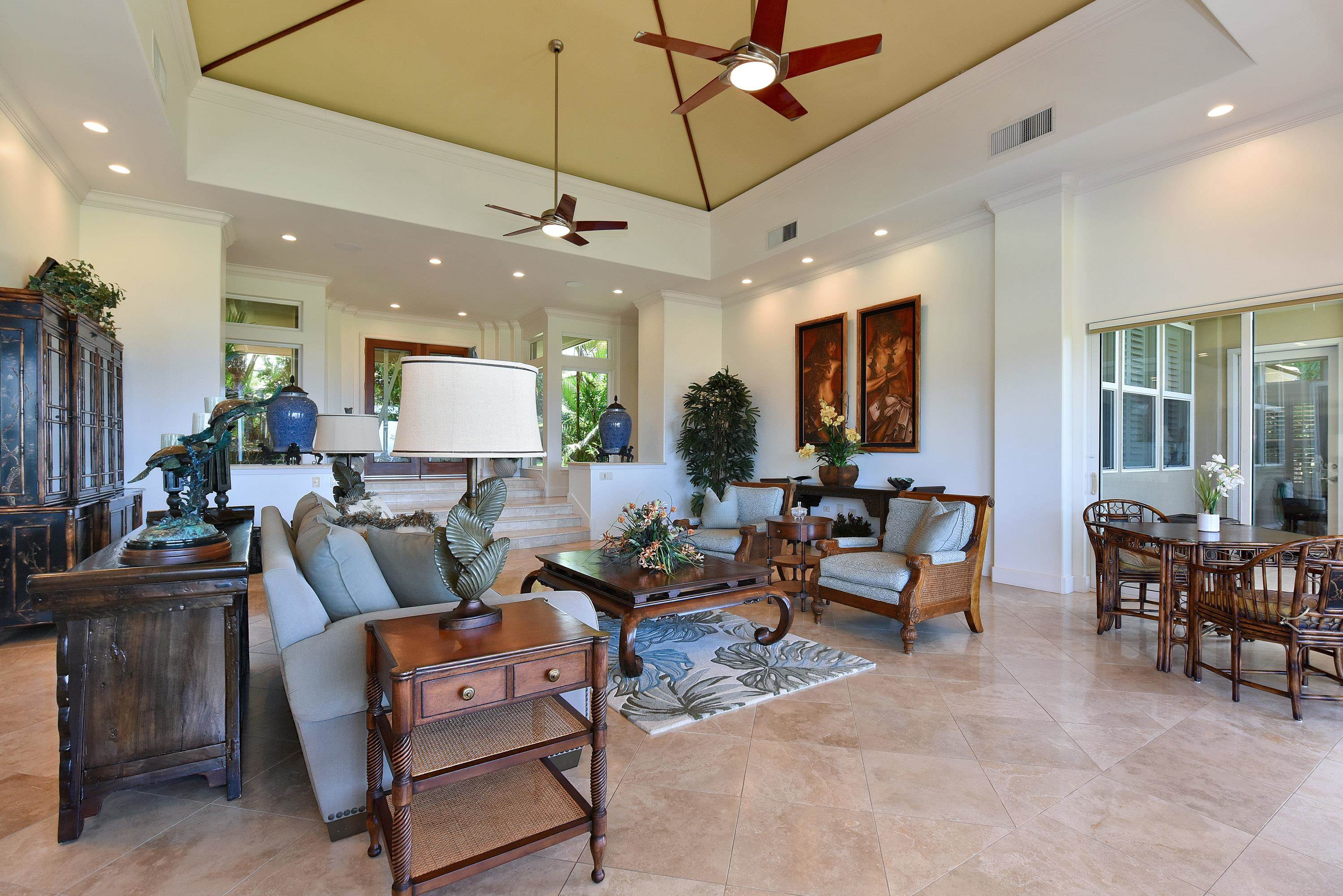 175 Ulukoa Place Lahaina, HI 96761 - Photo 10 of 50 a living room with furniture and a chandelier
