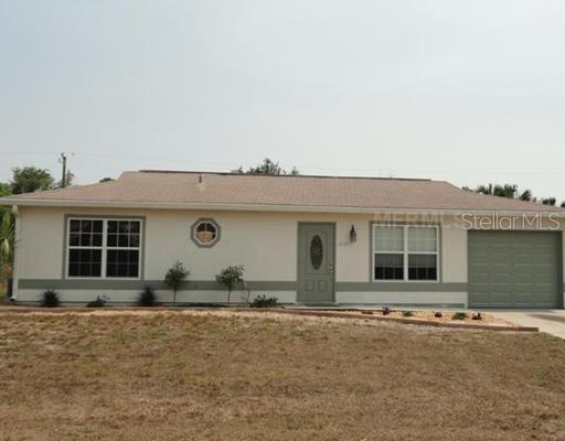 21077 Riddle Avenue Port Charlotte, FL 33954 - Photo 1 of 1 Exterior Front