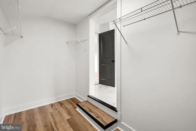 a view of a backyard with small garden