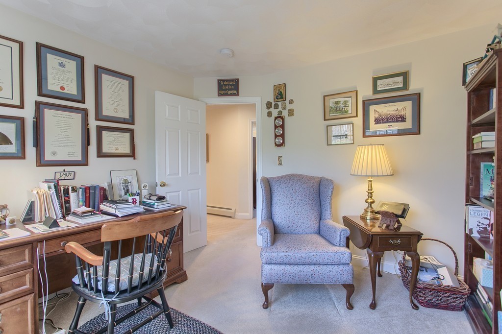 12 Meadow Road Beverly, MA 01915 - Photo 15 of 30 a living room with furniture a lamp and a potted plant