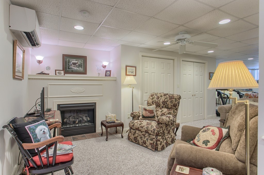 12 Meadow Road Beverly, MA 01915 - Photo 21 of 30 a living room with furniture and a fireplace