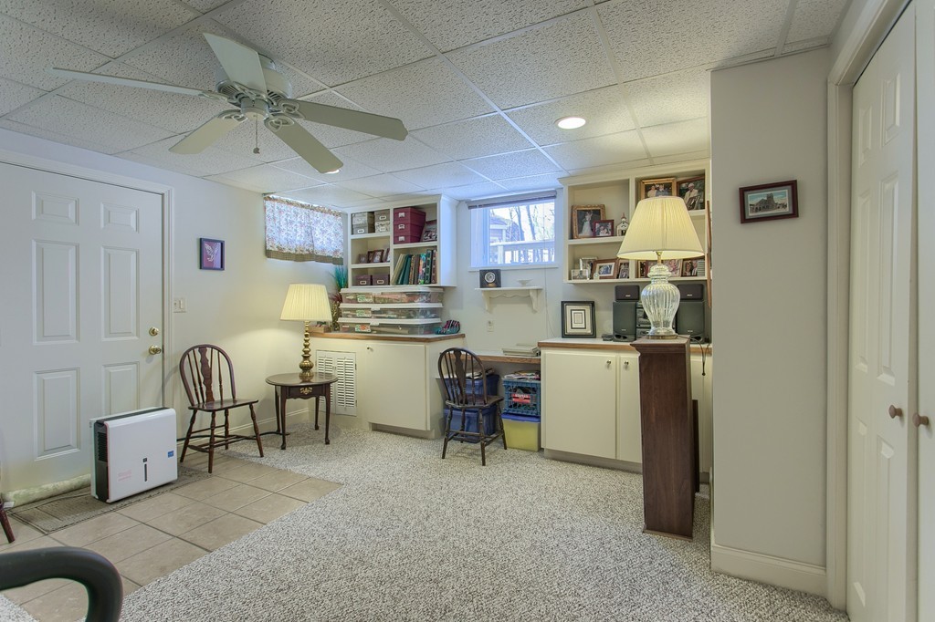 12 Meadow Road Beverly, MA 01915 - Photo 22 of 30 a room with furniture a desk and chair