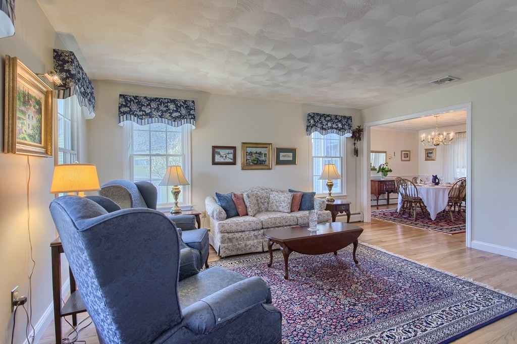 12 Meadow Road Beverly, MA 01915 - Photo 4 of 30 a living room with furniture and a rug