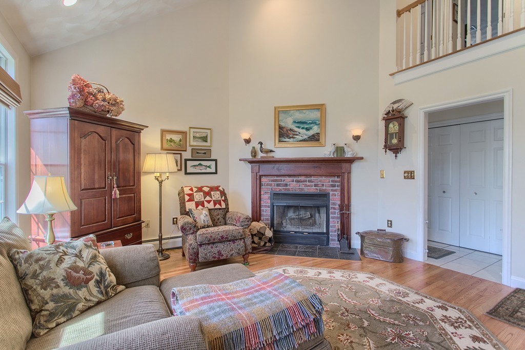 12 Meadow Road Beverly, MA 01915 - Photo 10 of 30 a living room with furniture and a fireplace