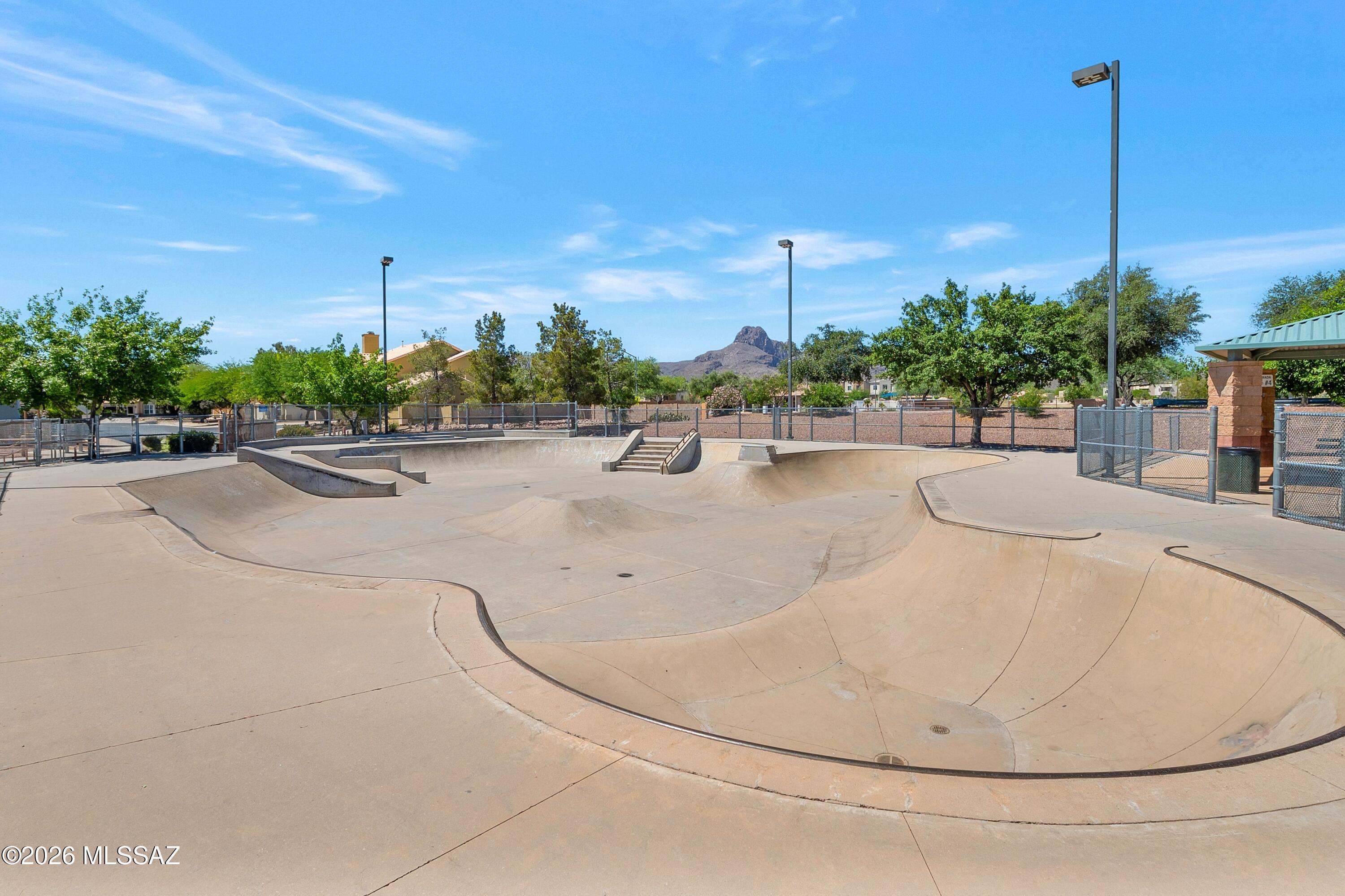 7159 West Maple Ridge Drive Tucson, AZ 85743 - Photo 33 of 42 a view of a swimming pool and a terrace