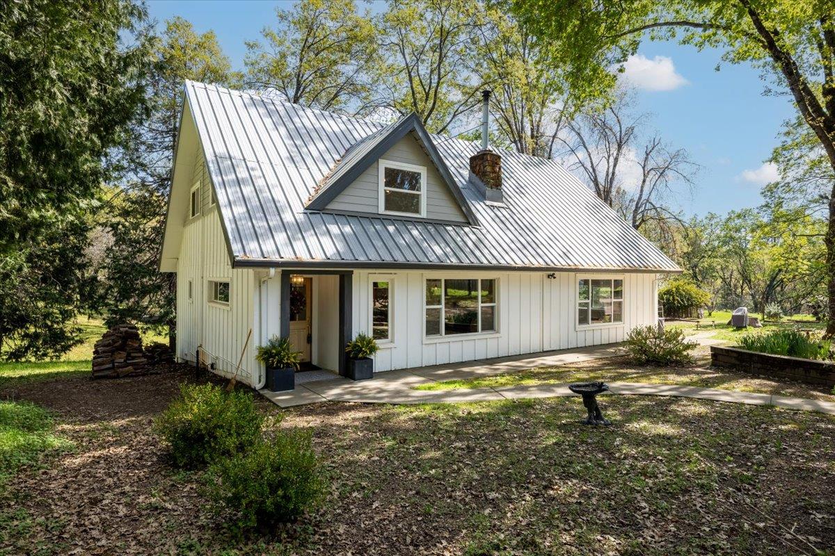 4963 Del Haven Road Placerville, CA 95667 - Photo 1 of 53 a view of a house with a yard