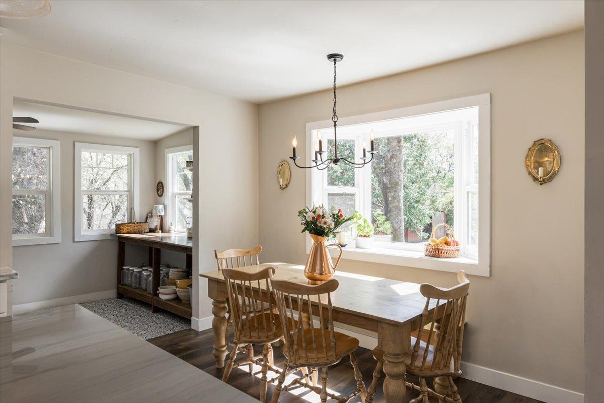 4963 Del Haven Road Placerville, CA 95667 - Photo 15 of 53 a view of a dining room with furniture window and outside view