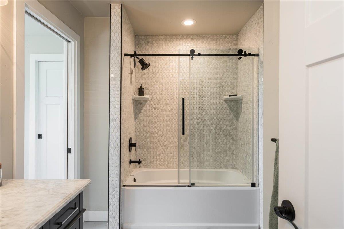 4963 Del Haven Road Placerville, CA 95667 - Photo 30 of 53 a bathroom with a shower and a bath tub