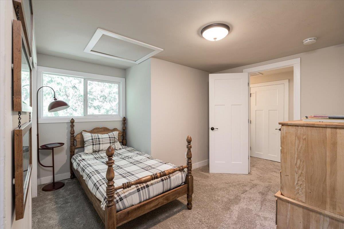 4963 Del Haven Road Placerville, CA 95667 - Photo 33 of 53 a bedroom with a bed window and a table