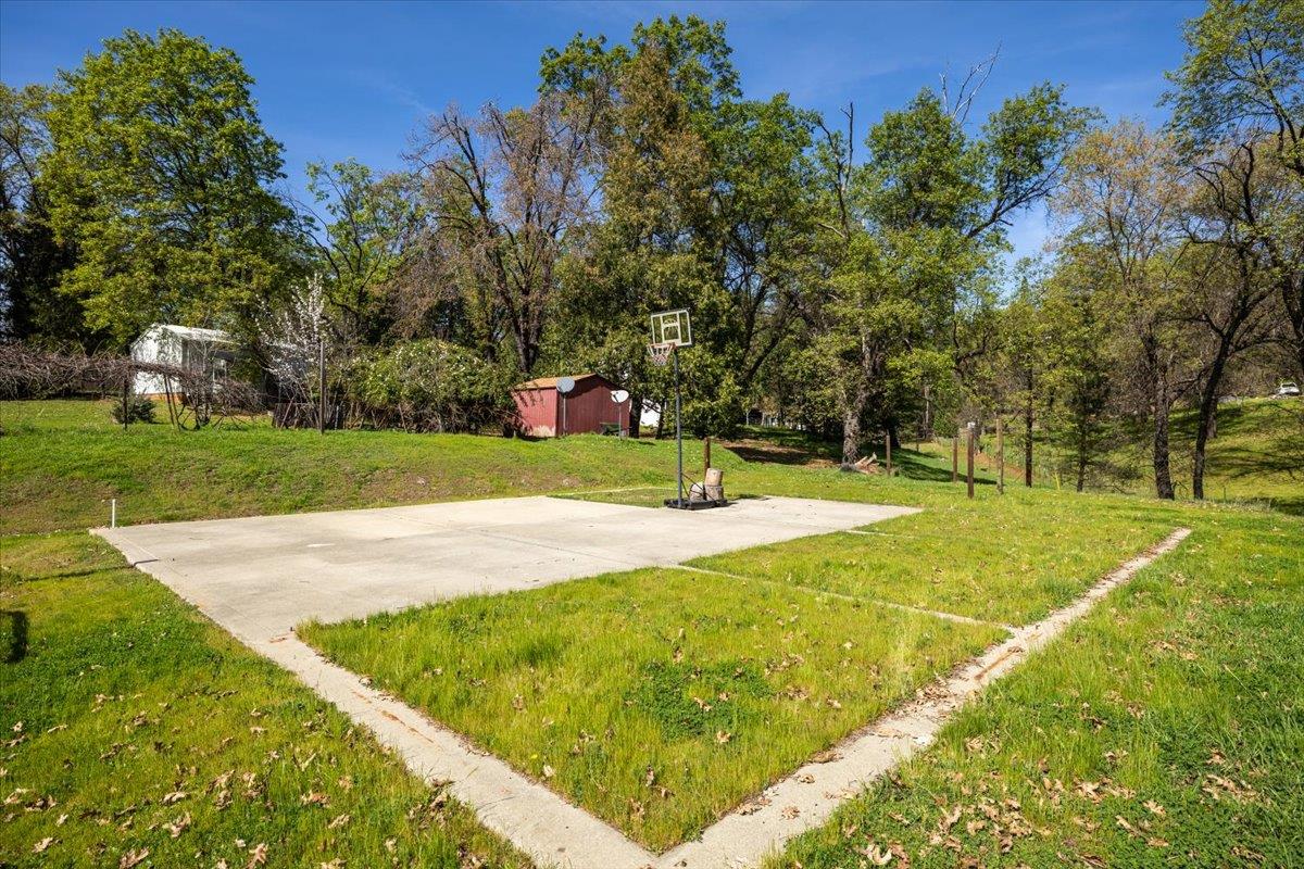 4963 Del Haven Road Placerville, CA 95667 - Photo 48 of 53 a view of a playground with basketball court