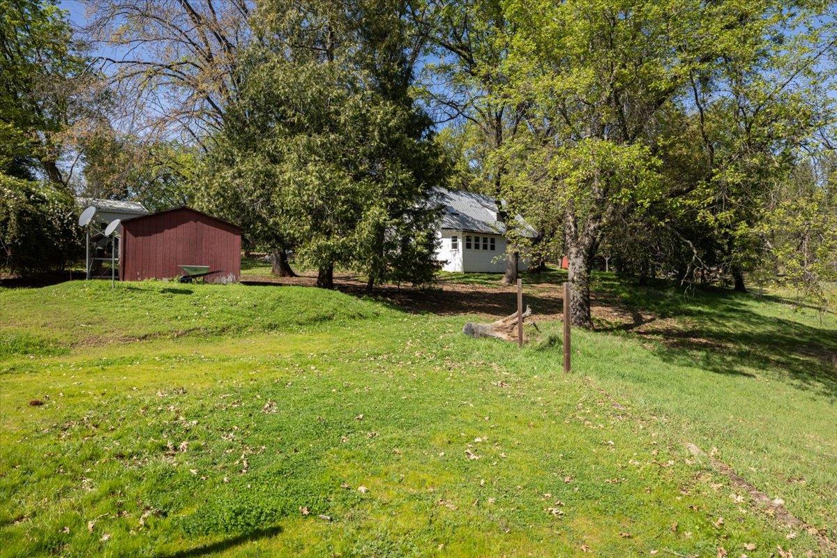 4963 Del Haven Road Placerville, CA 95667 - Photo 49 of 53 a view of a house with a backyard