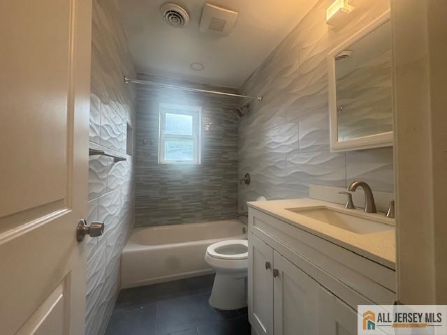 37 Judson Street Edison, NJ 08837 - Photo 8 of 11 a bathroom with a granite countertop bathtub shower sink vanity and toilet