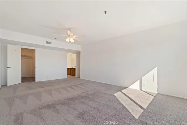 a view of an empty walk in closet
