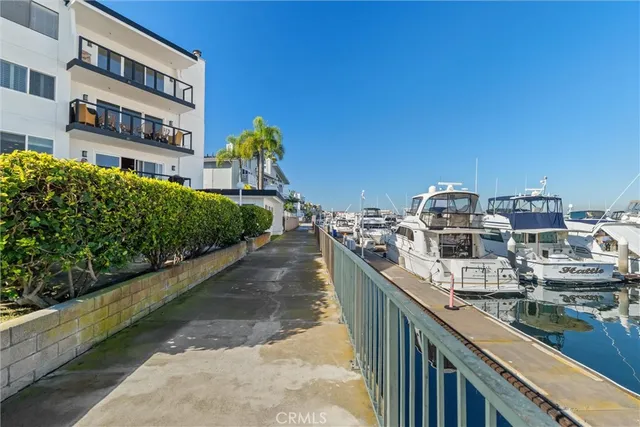 a view of a ocean with boats and water view