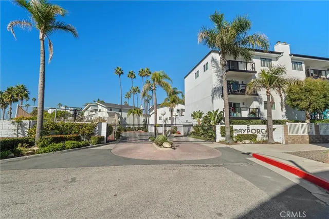 a big room with windows and a table