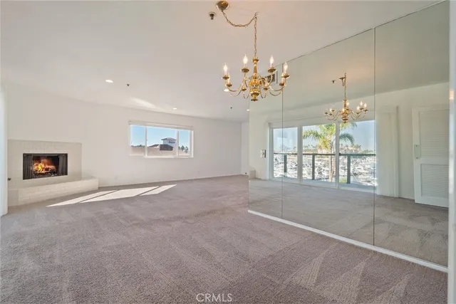 a kitchen with a sink and a refrigerator