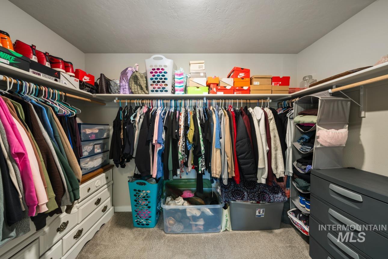 12443 Varga Street Caldwell, ID 83607 - Photo 24 of 27 Spacious closet featuring carpet