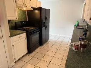 a kitchen with a sink and a stove